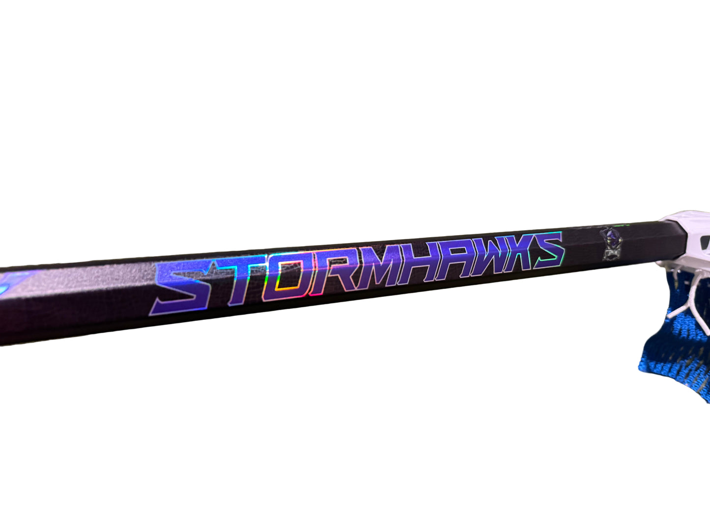 Custom lacrosse stick with a black base color and purple and green graphic design, featuring the text 'STORMHAWKS'.