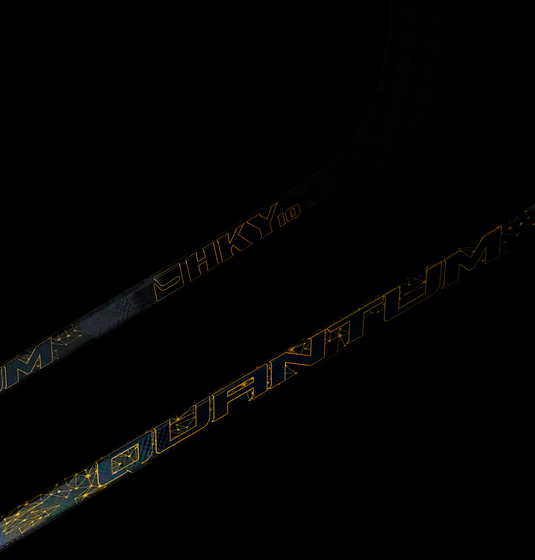 HKY IQ Quantum hockey stick with 24K carbon fiber weave on dark background